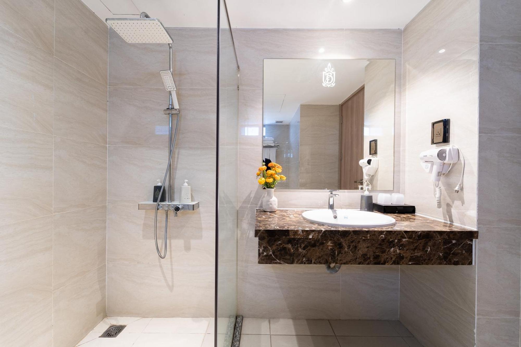 Nicecy Hotel Suites & Spa Cidade de Ho Chi Minh Quarto foto