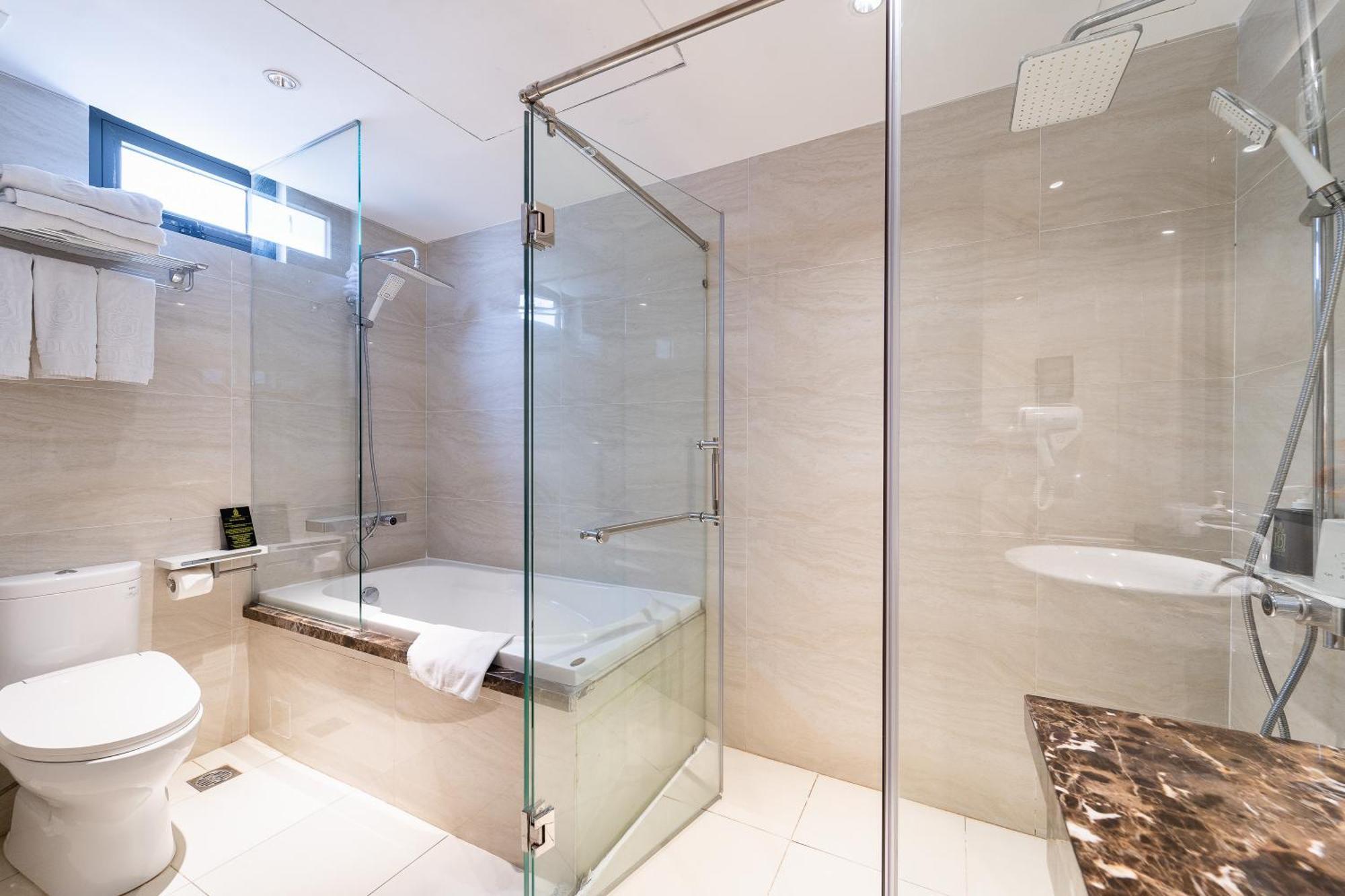 Nicecy Hotel Suites & Spa Cidade de Ho Chi Minh Quarto foto