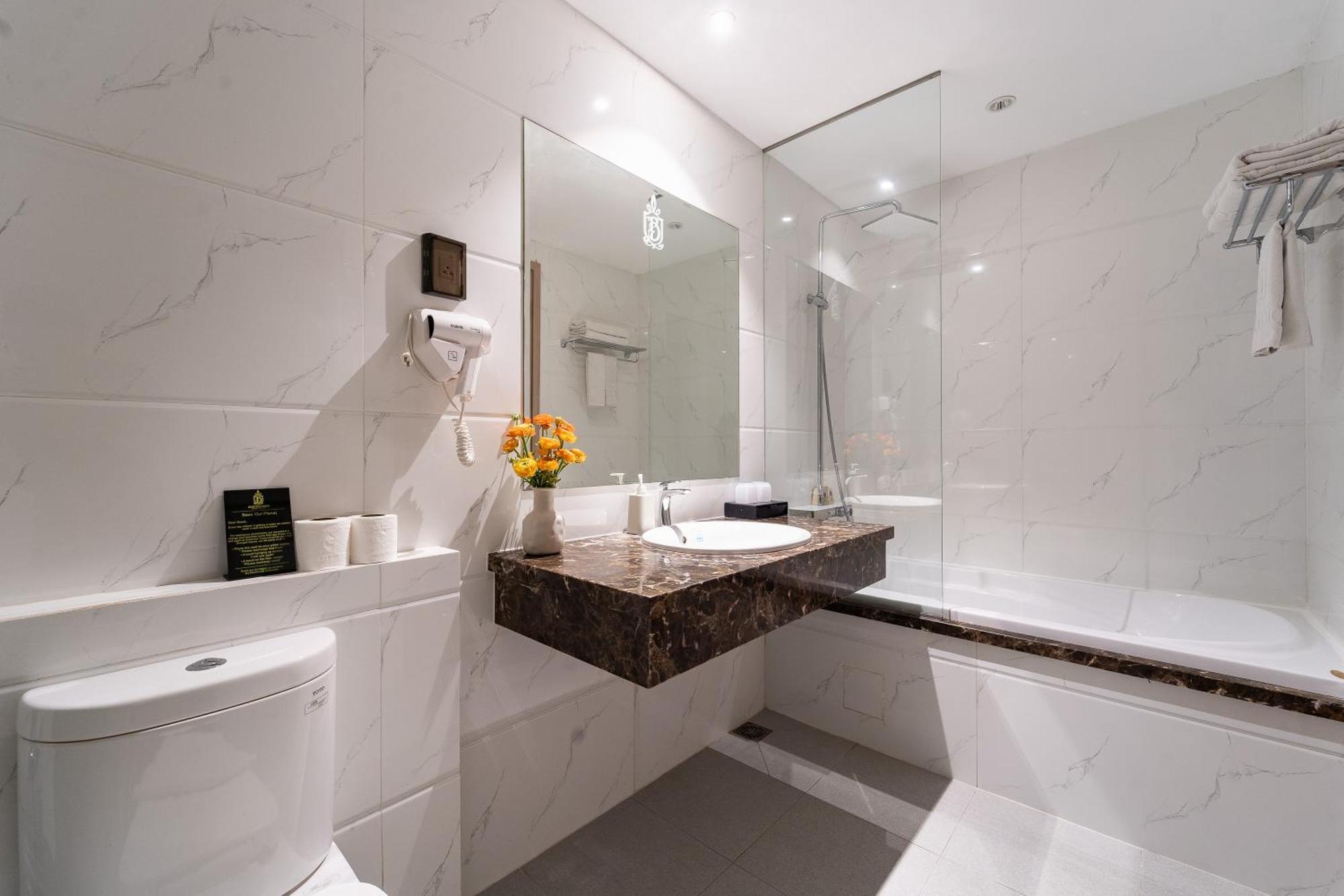 Nicecy Hotel Suites & Spa Cidade de Ho Chi Minh Quarto foto