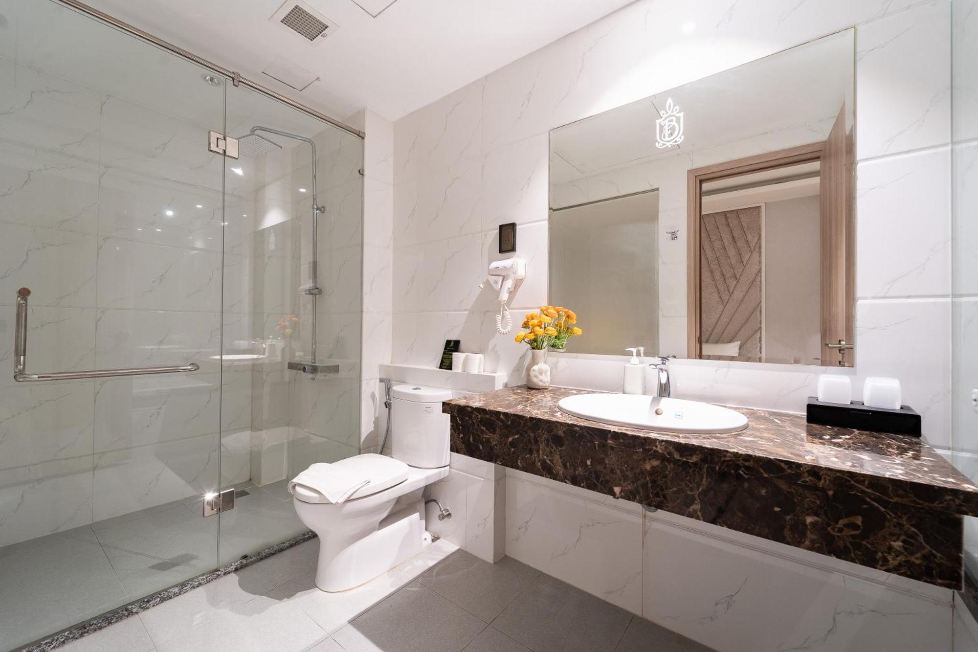 Nicecy Hotel Suites & Spa Cidade de Ho Chi Minh Quarto foto