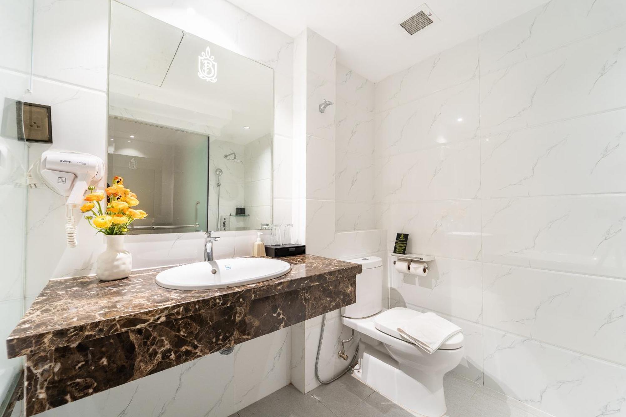 Nicecy Hotel Suites & Spa Cidade de Ho Chi Minh Quarto foto