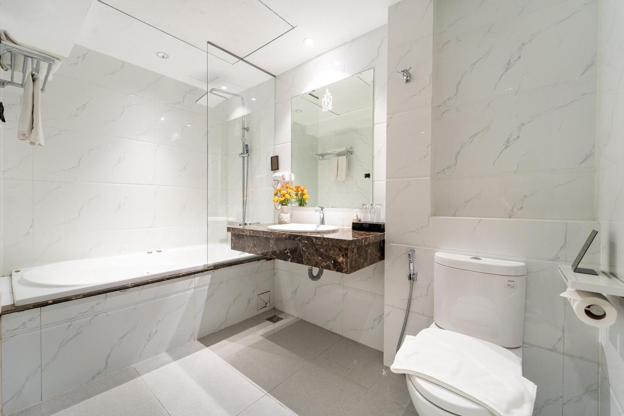 Nicecy Hotel Suites & Spa Cidade de Ho Chi Minh Quarto foto